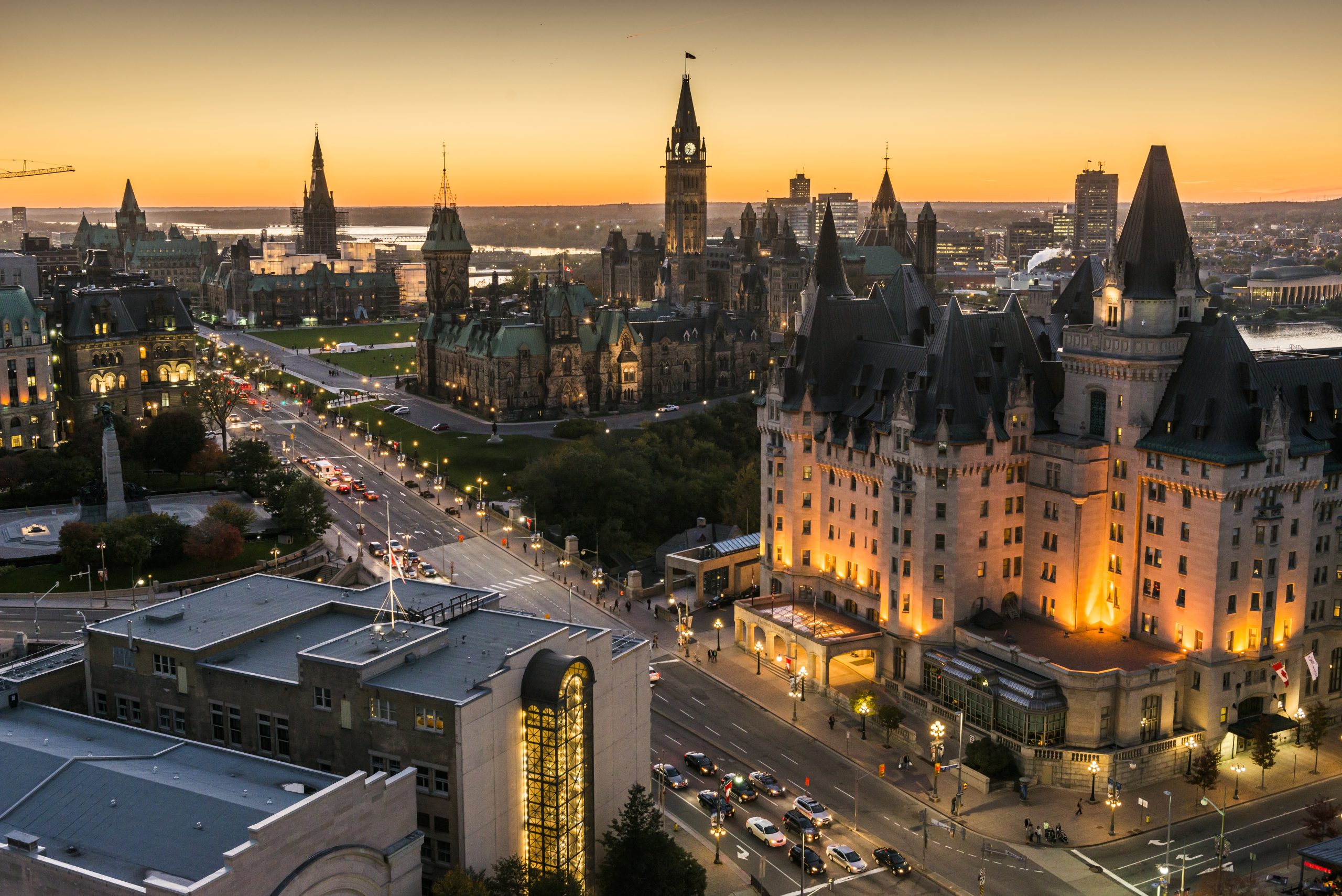 Panoramic view of downtown Ottawa with Parliament Hill, Fairmont Château Laurier and Government Conference Centre